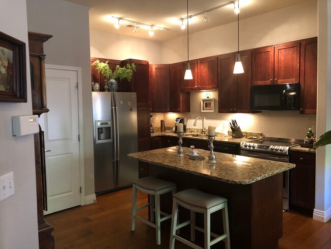 Modern kitchen with stone counters - 200 Poplar St