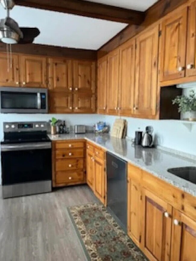 Kitchen with updated applianes - 68 Main St