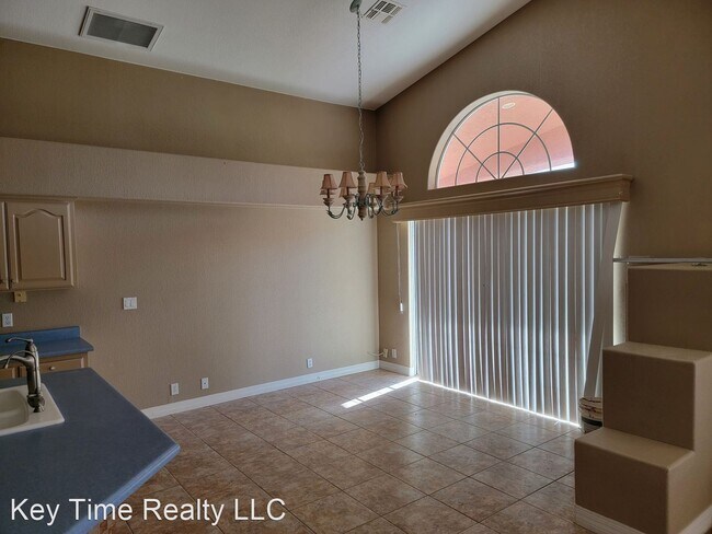 Building Photo - 3 br, 2 bath House - 5708 Desert Lakes Drive
