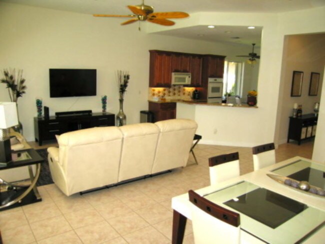 Building Photo - Fully Furnished Pool Home PGA Village