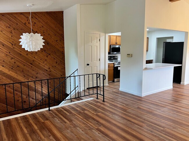 Stairs up to the open living / dining / kitchen space - 6215 S Sterne Pky