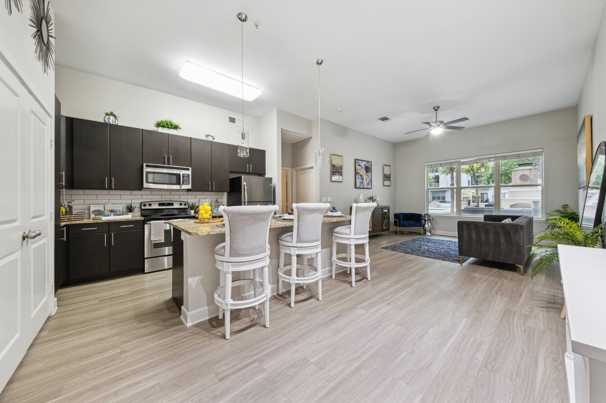 Modern Kitchen and Dining Room at Addison Keller Springs Apartments in Addison, TX - Addison Keller Springs