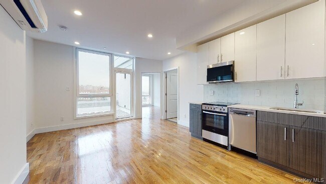 Building Photo - 138-28 Queens Blvd