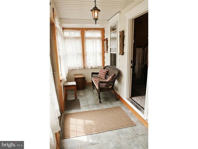 Porch - 120 W Franklin St