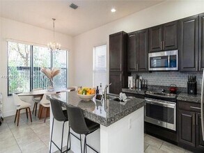 Building Photo - 9794 W 34th Ct