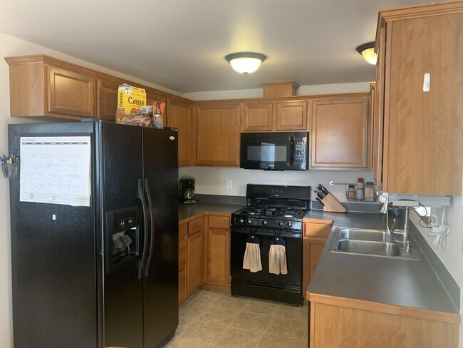 Building Photo - 6421 Portal Commons Pl