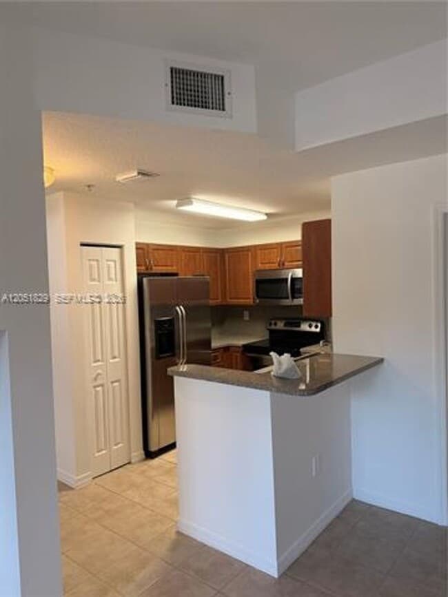 Photo - 906 SW 143rd Ave th 2005, Pembroke Pines, FL 33027 Apartment