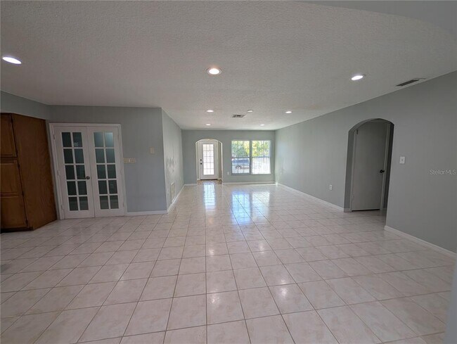Building Photo - 6947 Bottle Brush Dr