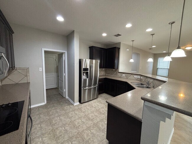 Building Photo - Spacious 3-Bed, 2-Bath Home with Covered P...