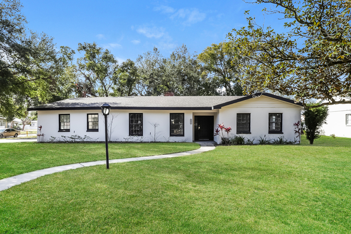 Primary Photo - Bright 4-Bedroom Home