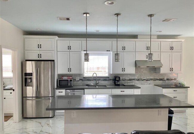 Foto del edificio - 5510 Teakwood Dr