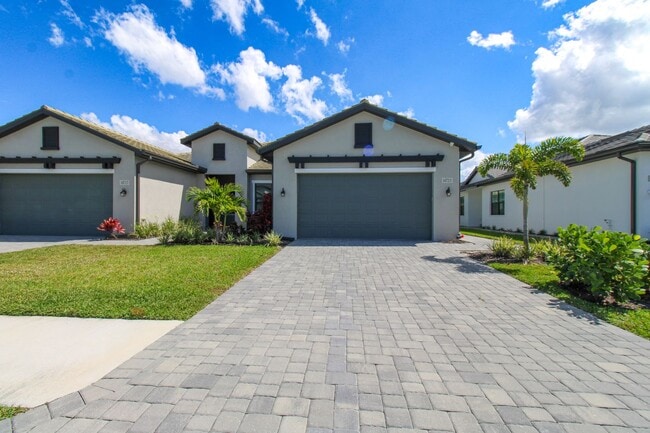 Building Photo - ** BRAND NEW CONSTRUCTION ULTRA-MODERN HOME **  MODEL HOME 2/2 PLUS DEN WITH OUTDOOR KITCHEN FOR ...