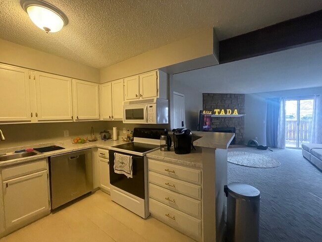 Kitchen - 10251 W 44th Ave