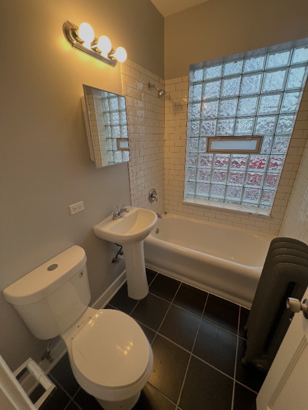 Building Photo - 7506 S Vernon Ave