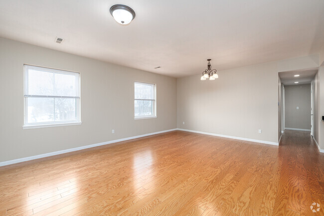 2BR, 1.5BA - 1,296SF - Living Room - Butternut Commons Luxury Apartments