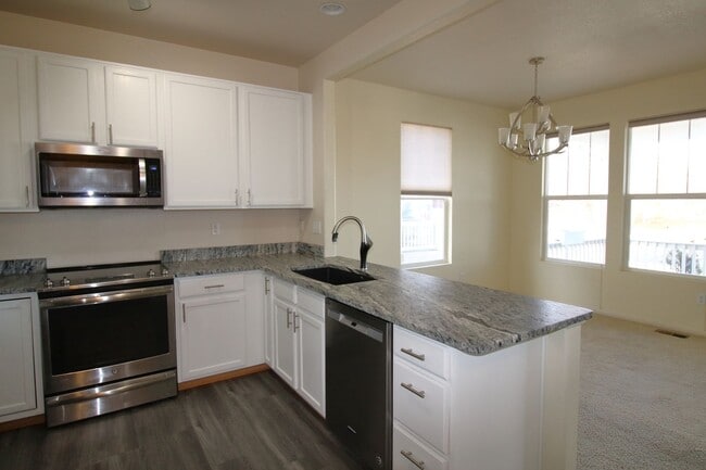 Building Photo - Updated 3bed/2.5bath/2car garage across fr...