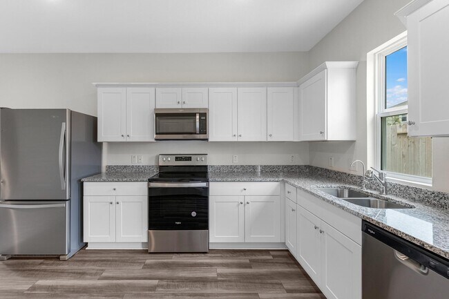 Foto del edificio - 10006 Tiger Flower Ln