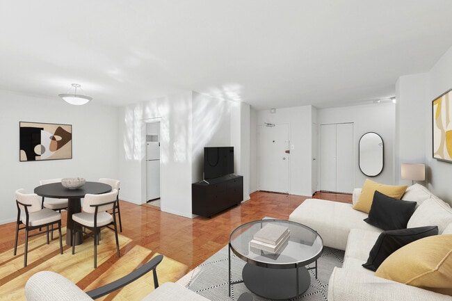 Living and dining area with hard surface flooring - The Statesman Apartments