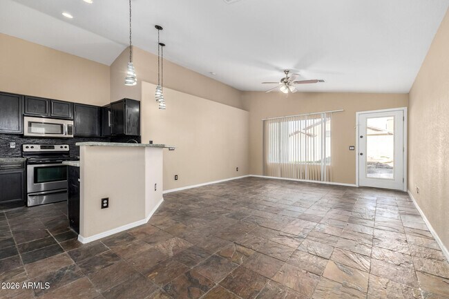 Building Photo - 8642 W Laurel Ln