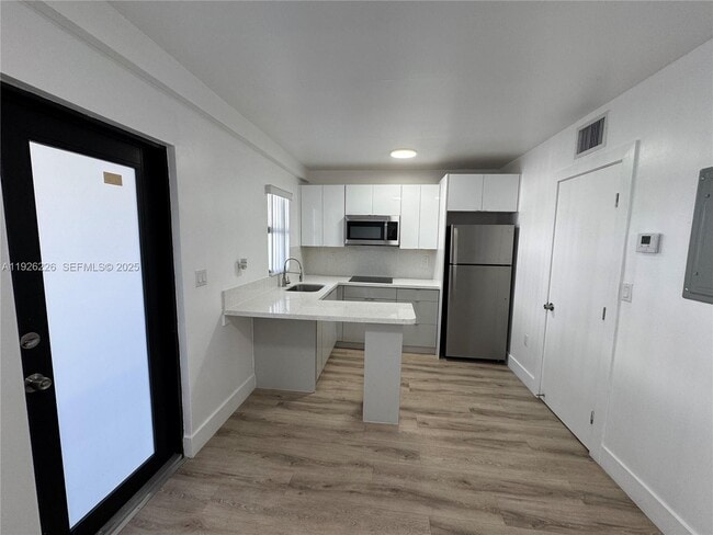 Building Photo - 1969 NW 2nd Ct