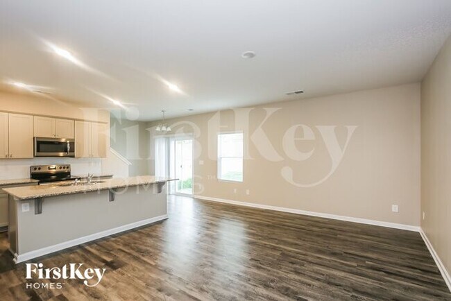 Foto del edificio - 10721 Rivergate Dr NW