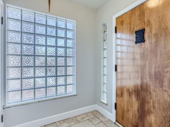Building Photo - Evolve Real Estate: Available 8/8/26 Brick Tudor with Large Yard and Finished Basement!