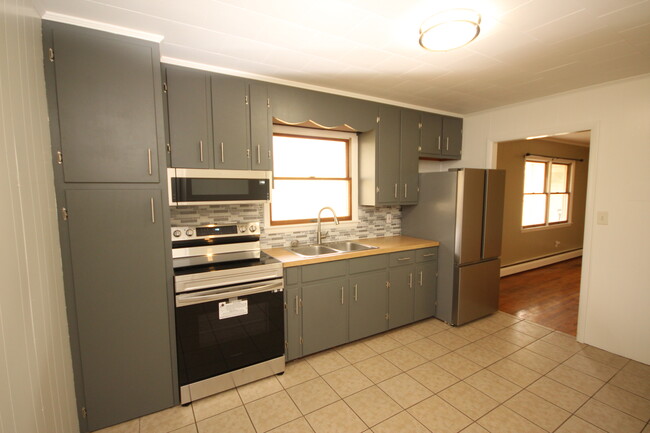 Example Photo - Updated kitchen in similar apartment - 2158 Mountain View Ave