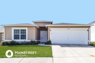 Building Photo - 7360 Lawn Tennis Ln