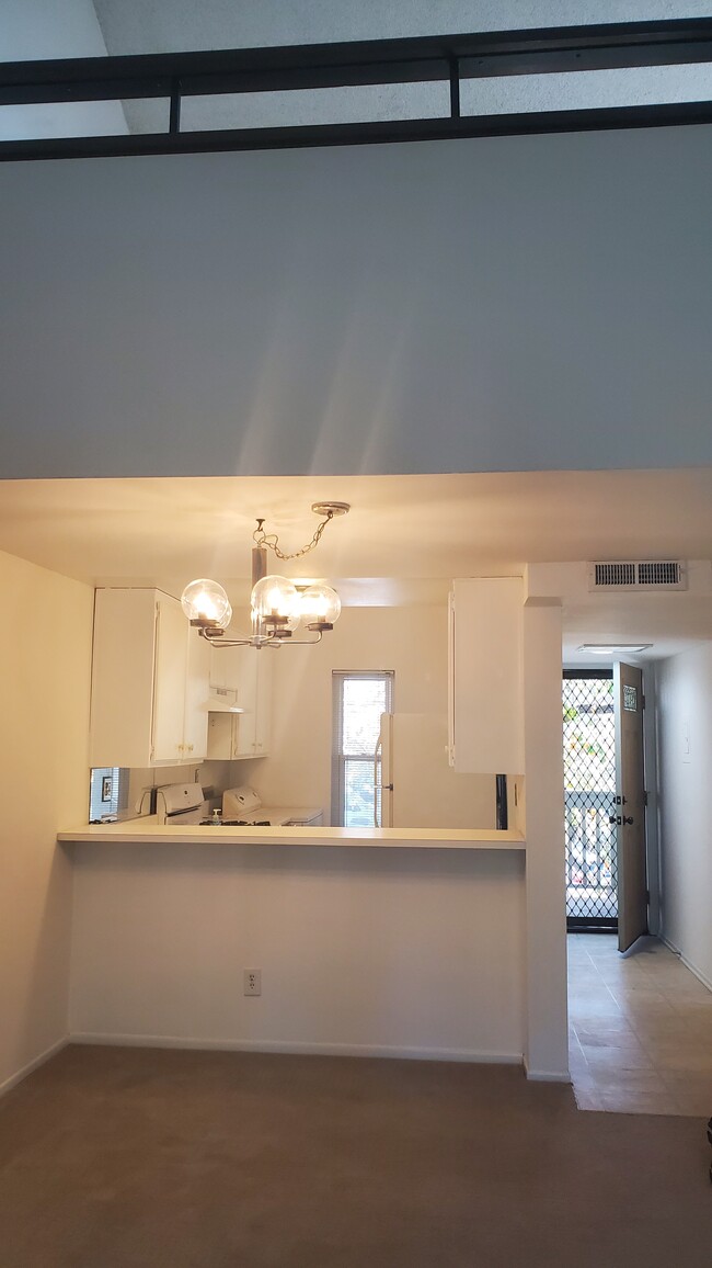 kitchen with loft above - 7131 Farralone Ave