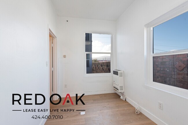 Foto del edificio - Charming One Bedroom with Beautiful Hardwo...