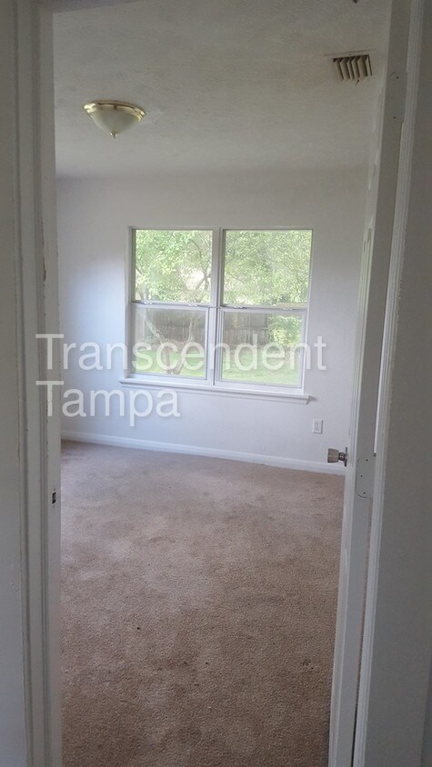 Building Photo - 1912 E Waters Ave