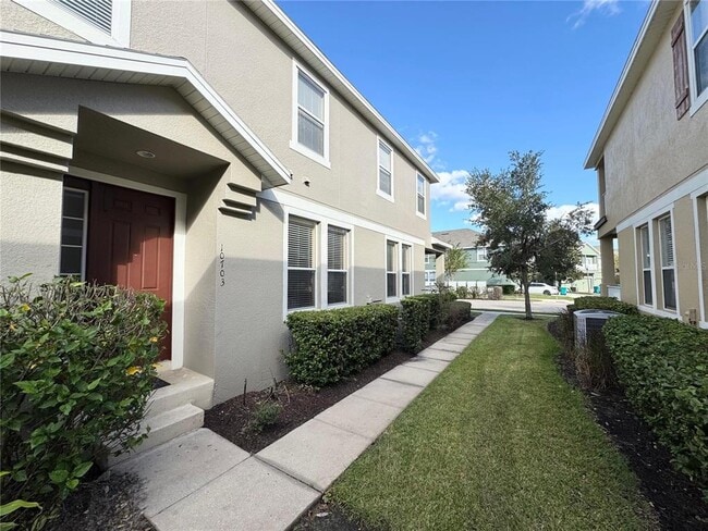 Foto del edificio - 10703 Yellow Tiger Lily Dr