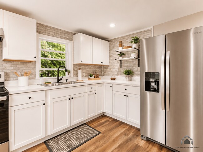 Foto del edificio - Spacious 3-Bedroom, 2-Bathroom Home – Heat Included!!!