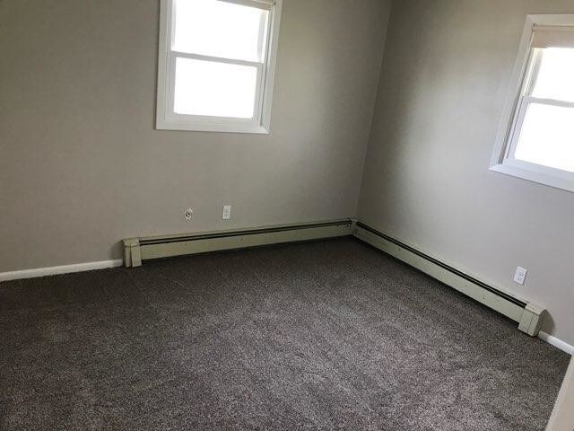 Building Photo - 1402 3rd Ave NW #1