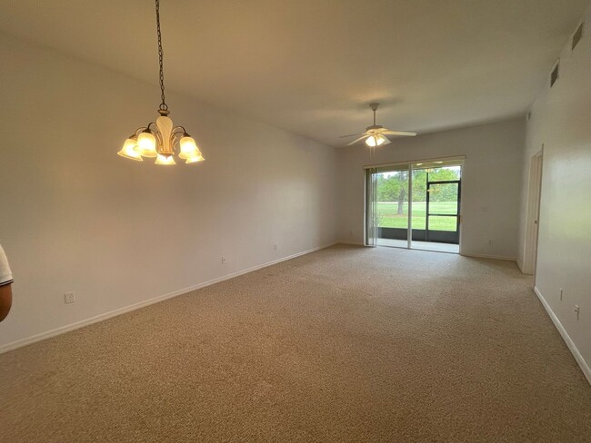 Building Photo - BEAUTIFUL and PRIVATE First Floor Golf Cou...