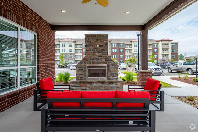 Outdoor Fireplace - Traditions at Hamilton Springs - Seniors 55+