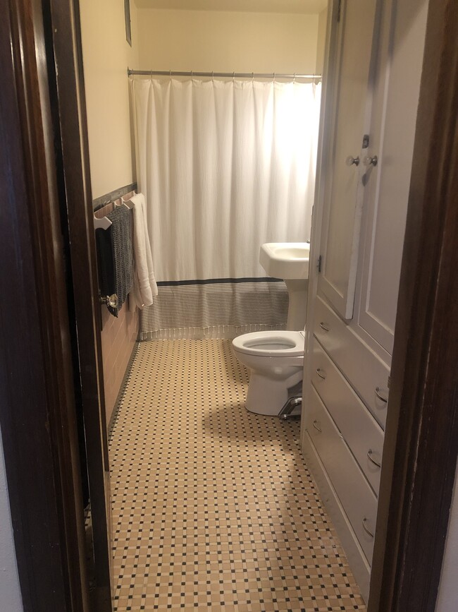 Original vintage tilework, built in linen cabinets, pedestal sink - 1631 16th Ave