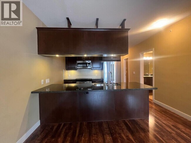 Photo du bâtiment - 11887 Burnett St.