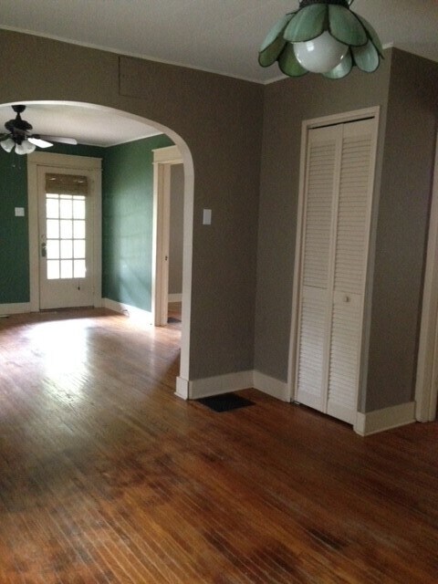 Dining room looking into living room and front door. - 209 E Vermilya Ave