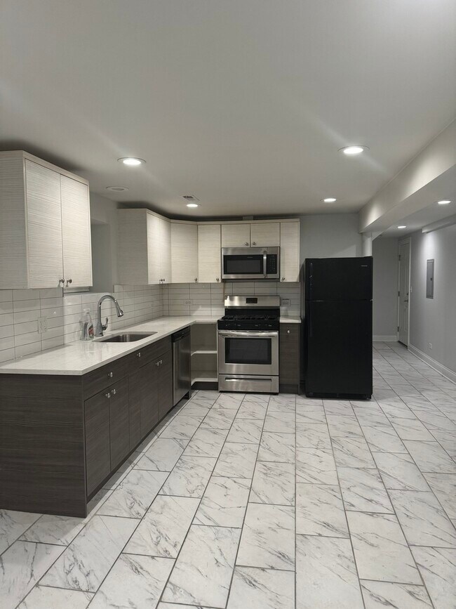 Foto del edificio - 7422 S Vernon Ave