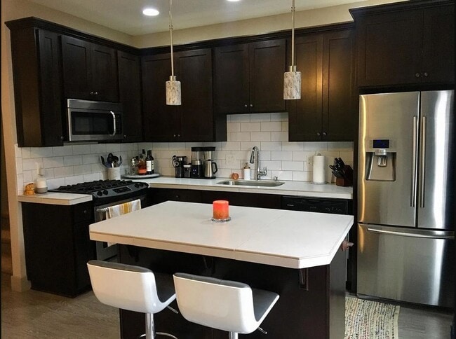Photo - Arbor Lodge Neighborhood Townhome with Central A/C, Garage, In-Unit Laundry, Fenced Backyard
