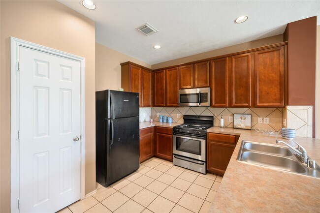 Foto del edificio - 9223 Carlin Bend Ln