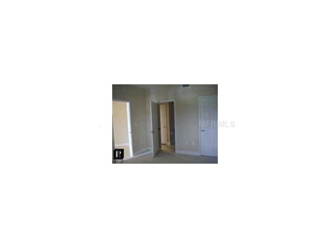 Building Photo - 7194 Key Haven 202