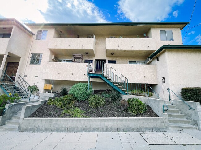 Exterior building. Unit 3 is first unit on the right of stairs - 1605 Waterloo St