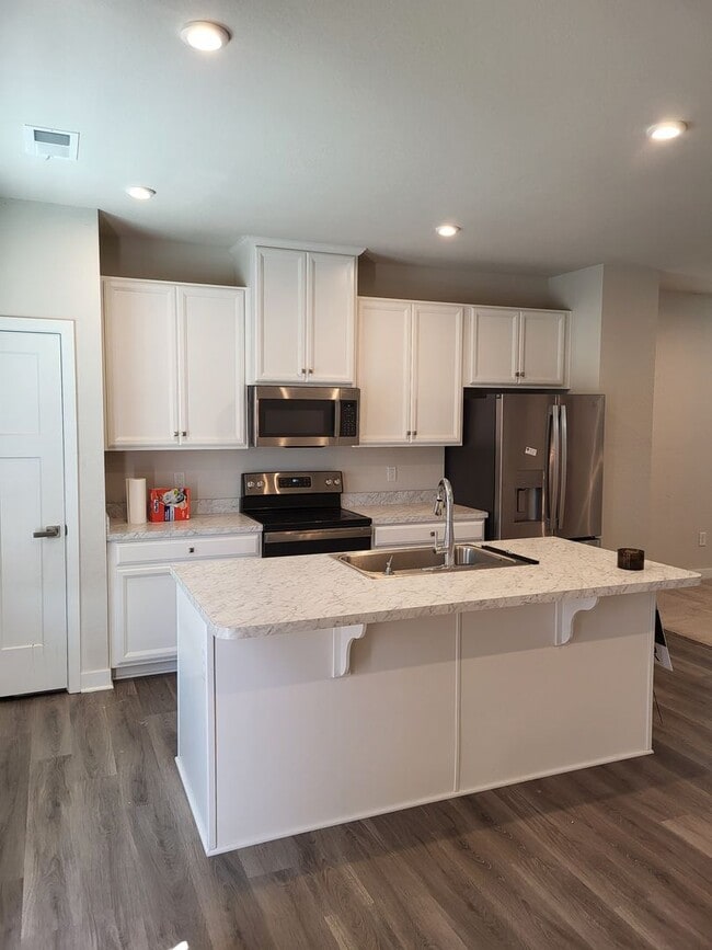 Building Photo - NEW PORT TOWNHOMES
