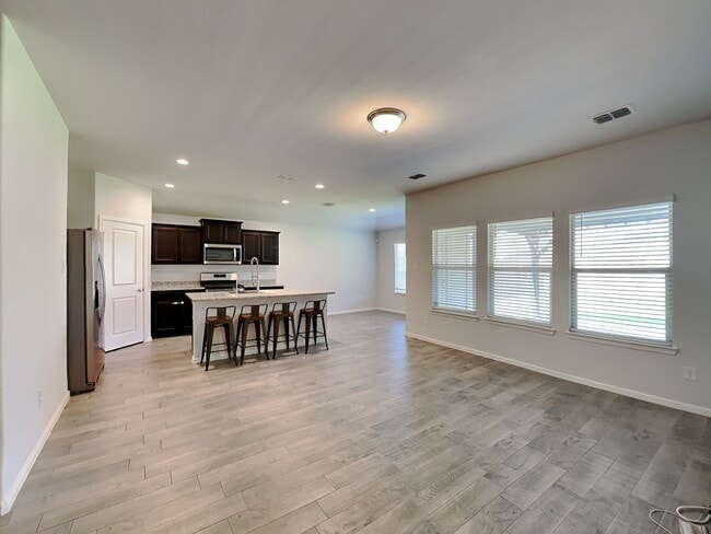 Building Photo - Chapel Creek Beauty with Designer Kitchen, Spacious Layout & Private Backyard Retreat!