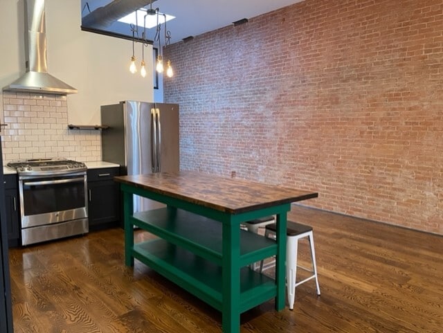 Kitchen island - 307 N Riverfront Dr Apartments