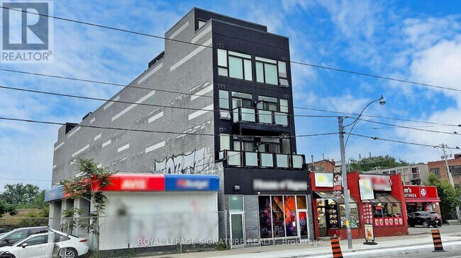 Photo du bâtiment - 335-335 College St