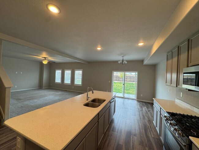 Building Photo - Spacious & Stylish 4BR Home in Lorson Ranc...