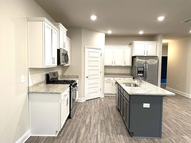 Building Photo - 8563 Rosefield Dr N